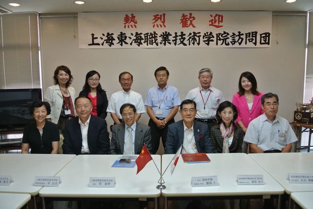 3-项校长一行与沟部学院领导合影.jpg